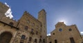 Palazzo Vecchio del PodestÃÂ  and Torre Rognosa in San Gimignano - perspective view Siena- Italy Royalty Free Stock Photo